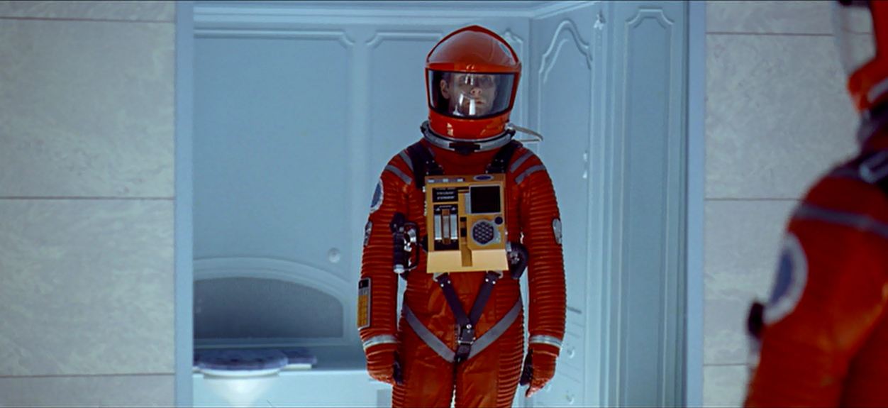 Dave-looking-at-himself-in-the-mirror-in-Stanley-Kubricks-2001-A-Space ...